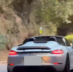 敞篷保時捷掛點滴上路引熱議　行車安全與醫療風險成焦點